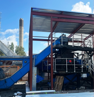 Trogkettenförderer und Hacker Biomasseheizkraftwerk